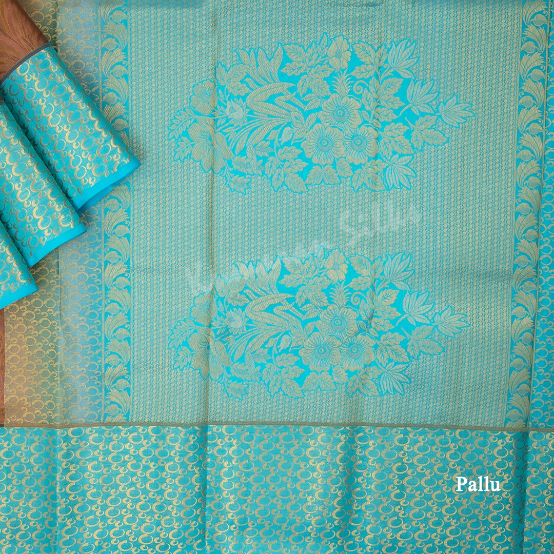 Brown Silk Saree With Floral Motif And Blue Border - Kumaran Silks