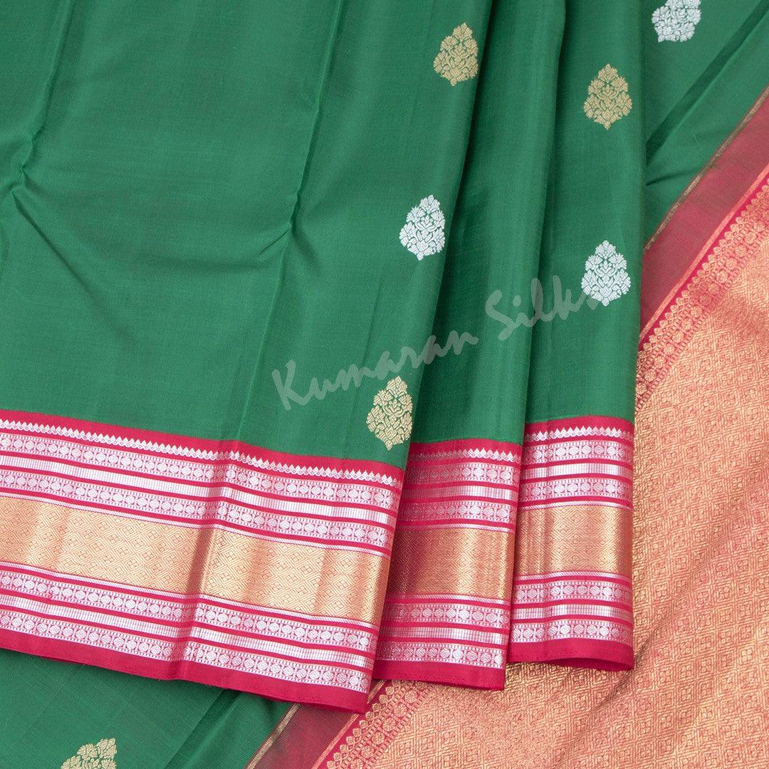 Bottle Green Silk Saree With Silver And Gold Zari Buttas And Rettapettai Border - Kumaran Silks