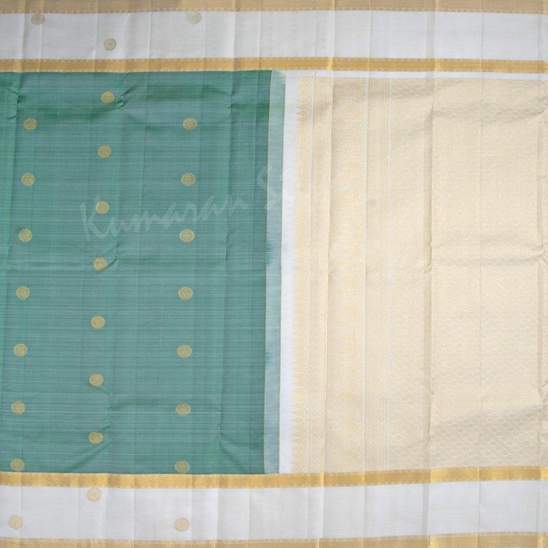 Light Green Silk Saree With Chakra Buttas And Rettapettai Border - Kumaran Silks