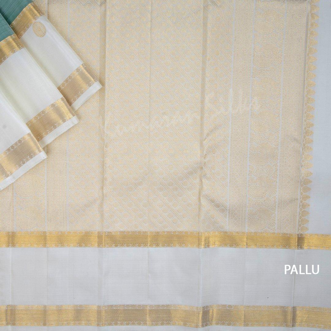 Light Green Silk Saree With Chakra Buttas And Rettapettai Border - Kumaran Silks