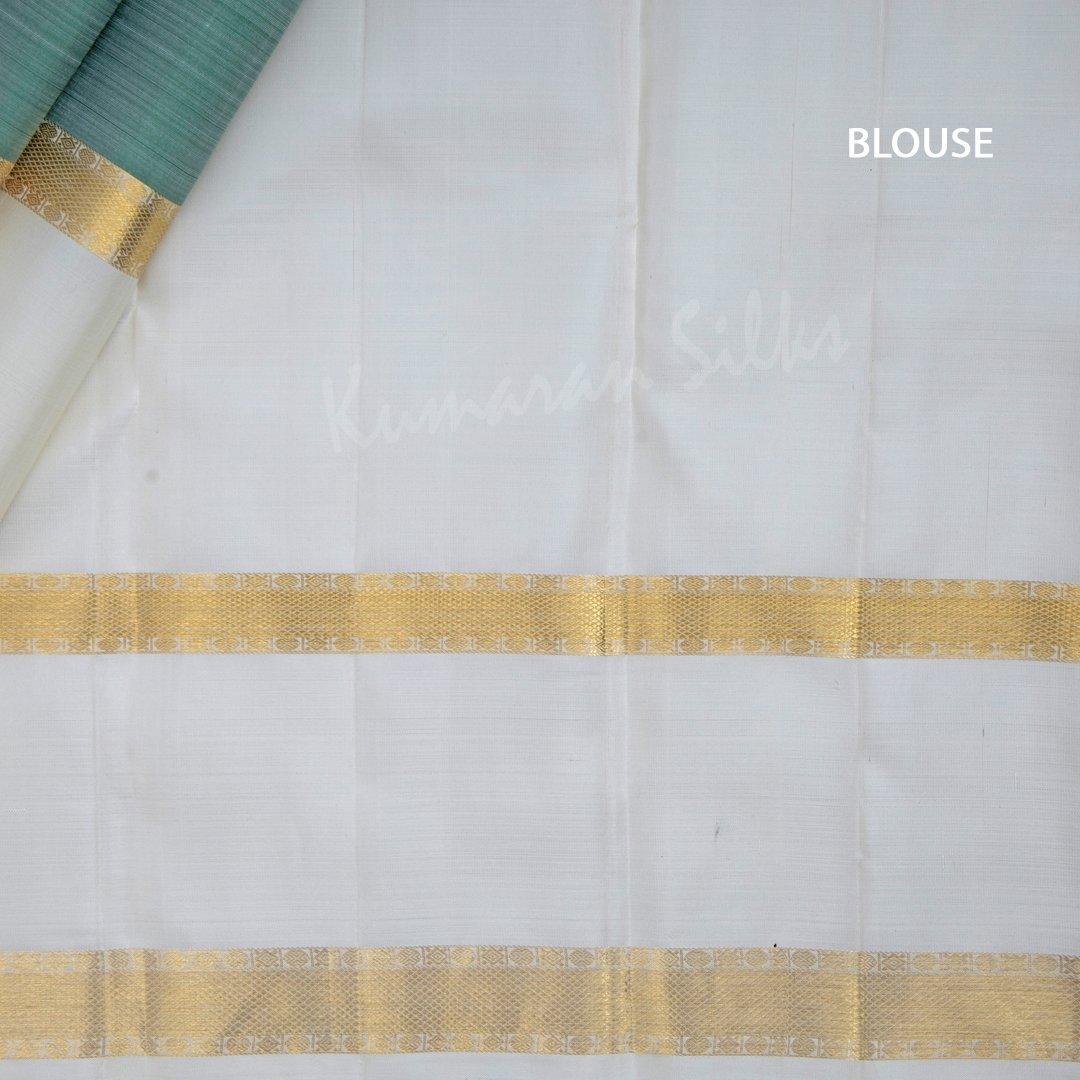 Light Green Silk Saree With Chakra Buttas And Rettapettai Border - Kumaran Silks