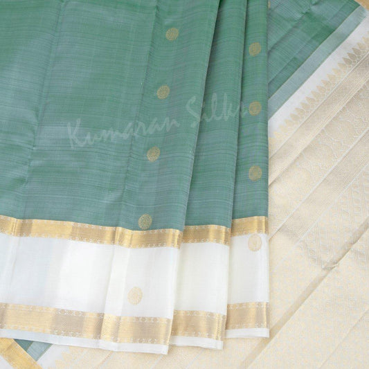 Light Green Silk Saree With Chakra Buttas And Rettapettai Border - Kumaran Silks