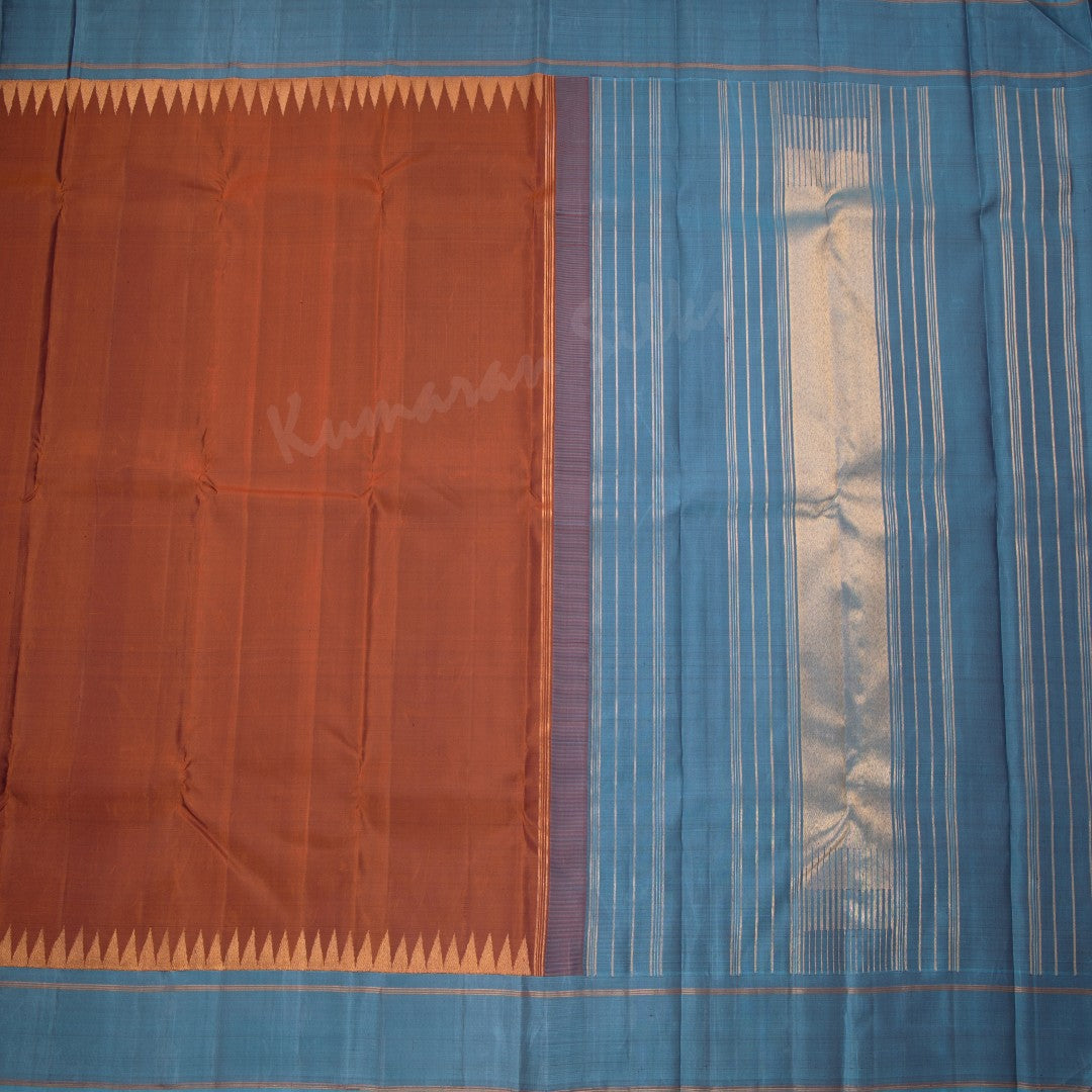 Cinnamon Brown Plain Silk Saree And Temple Design On Blue Border - Kumaran Silks