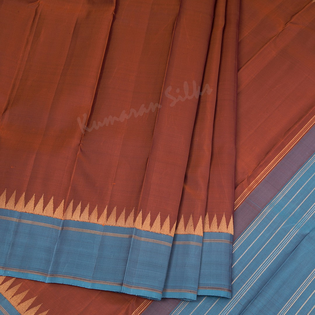 Cinnamon Brown Plain Silk Saree And Temple Design On Blue Border - Kumaran Silks