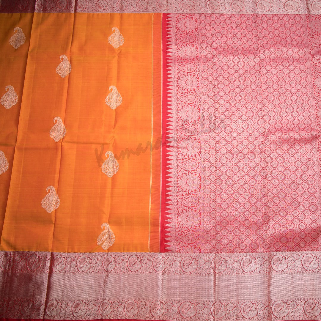 Orange Silk Saree With Mango Silver Zari Buttas And Rettapet Border