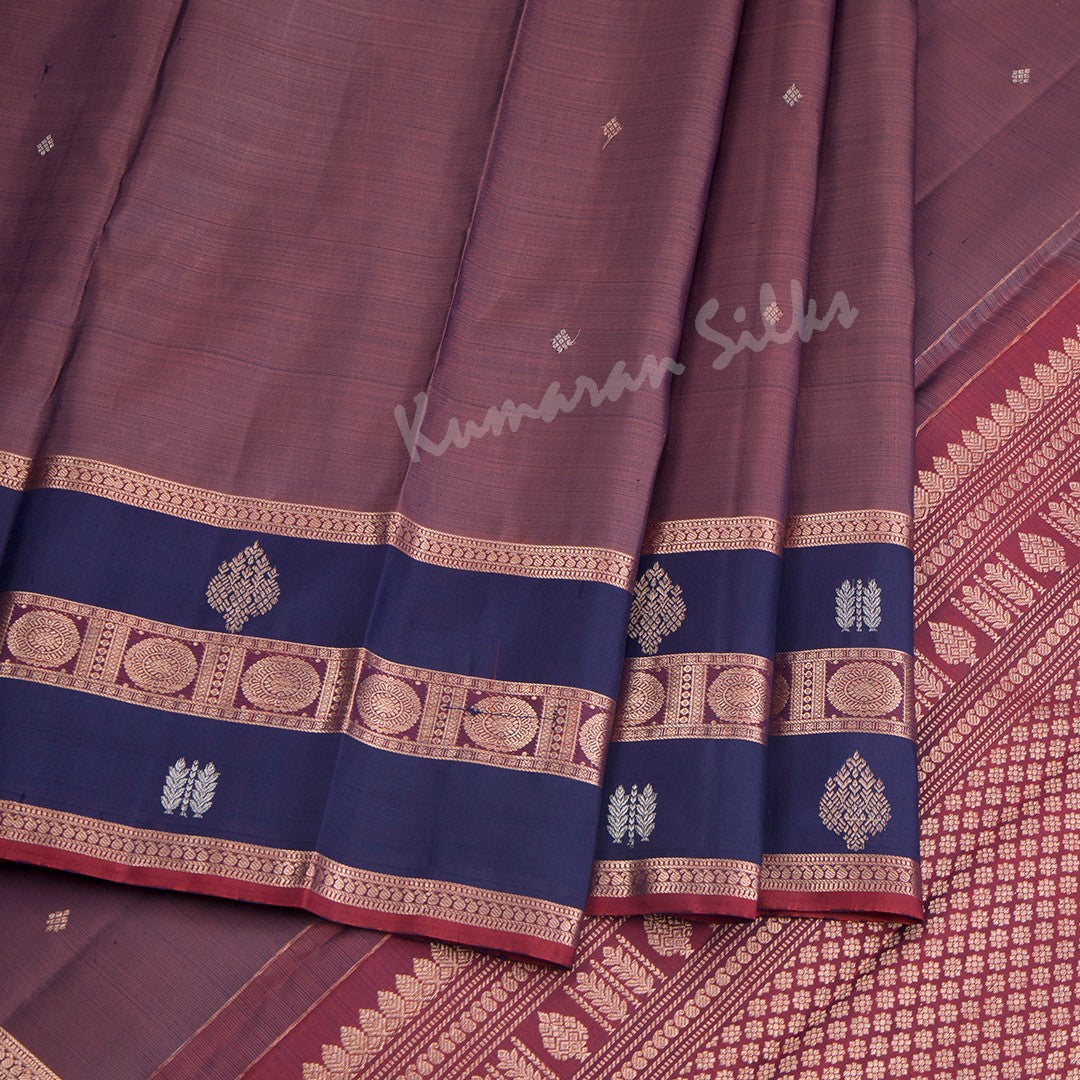 Shot Colour Silk Saree With Small Buttas And Navy Blue Zari Border