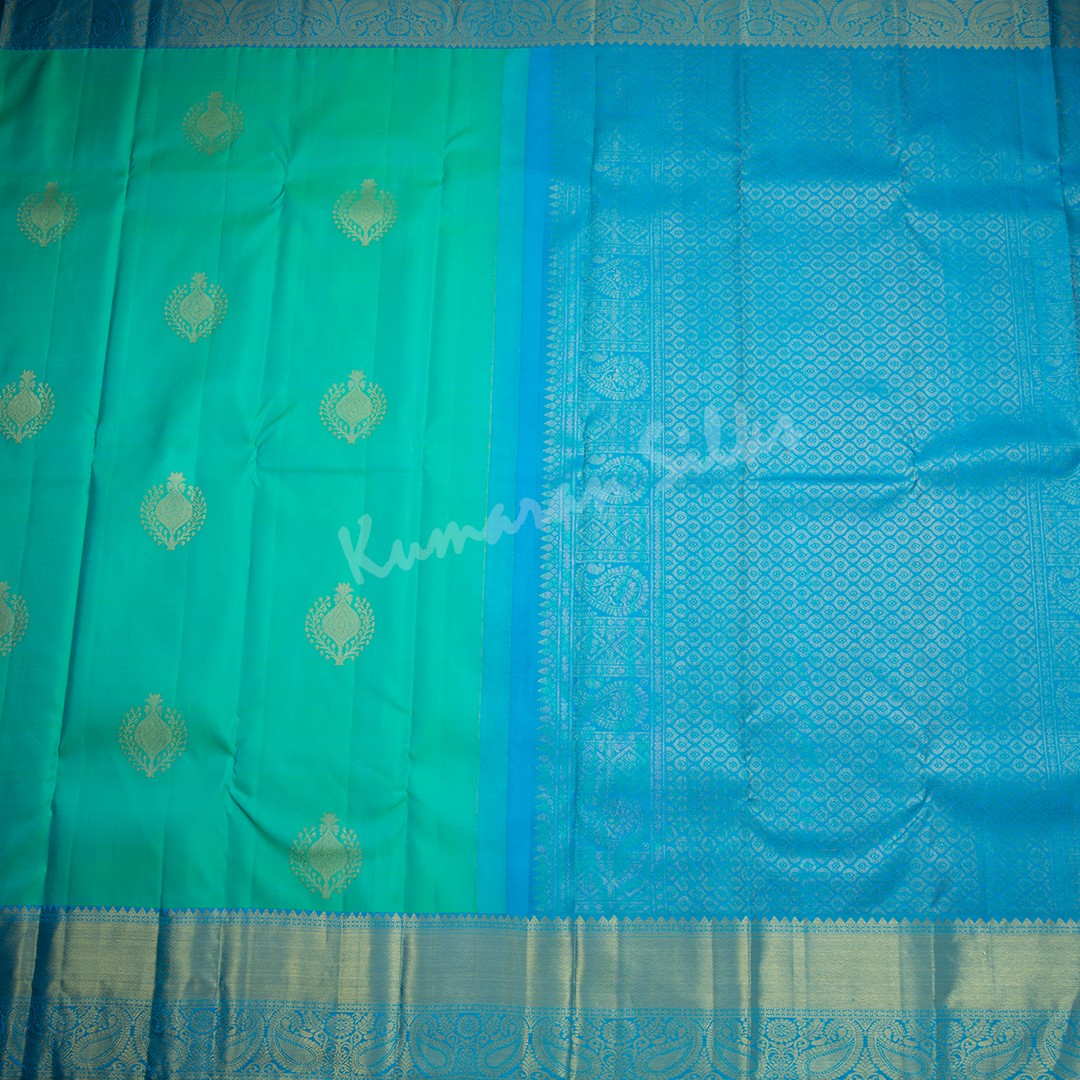 Aqua Blue Silk Saree With Tree Design And Blue Zari Border