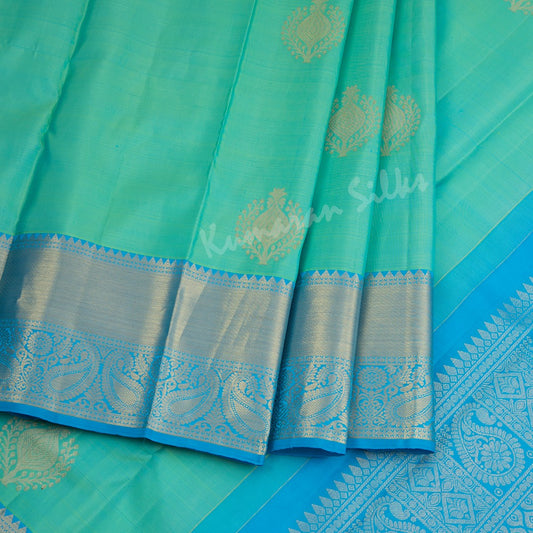 Aqua Blue Silk Saree With Tree Design And Blue Zari Border