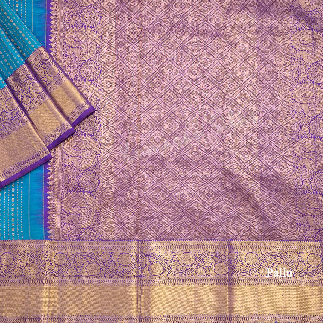 Peacock Blue Silk Saree With Vertical Zari Buttas And Purple Zari Border