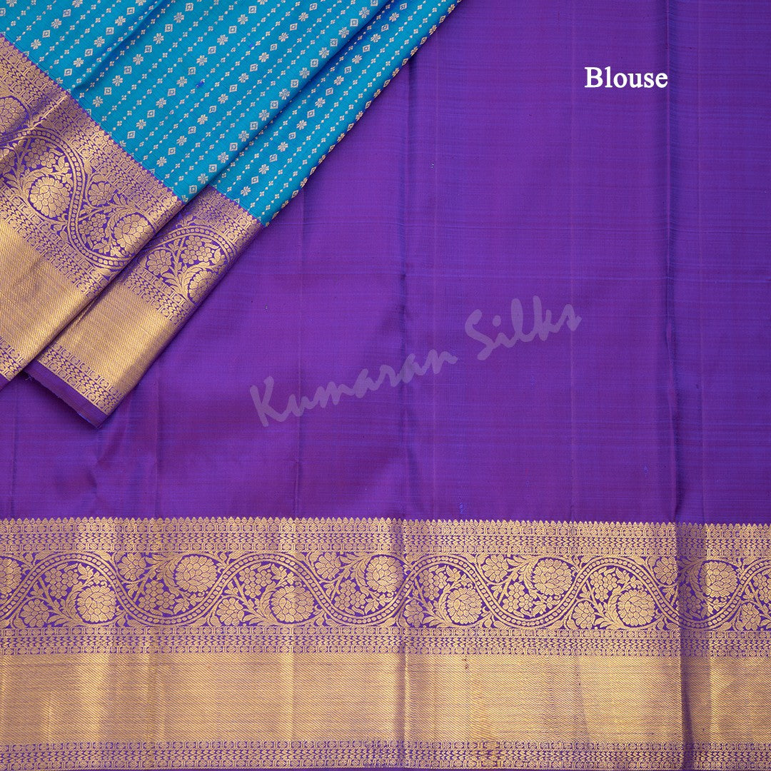 Peacock Blue Silk Saree With Vertical Zari Buttas And Purple Zari Border