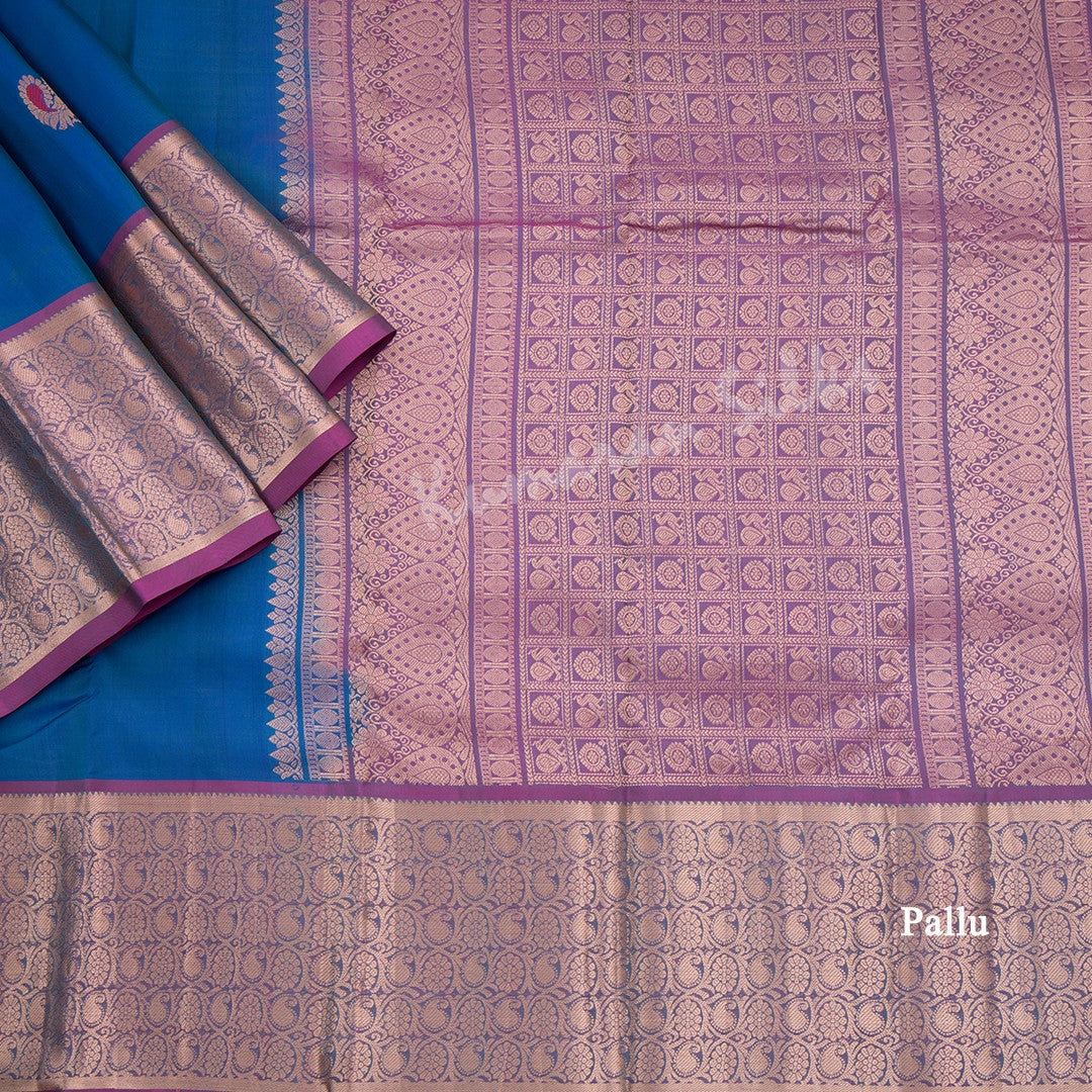 Peacock Blue Silk Saree With Peacock Zari Buttas And Copper Zari Border