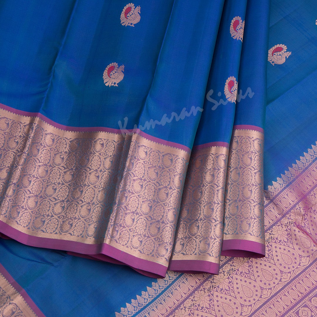 Peacock Blue Silk Saree With Peacock Zari Buttas And Copper Zari Border