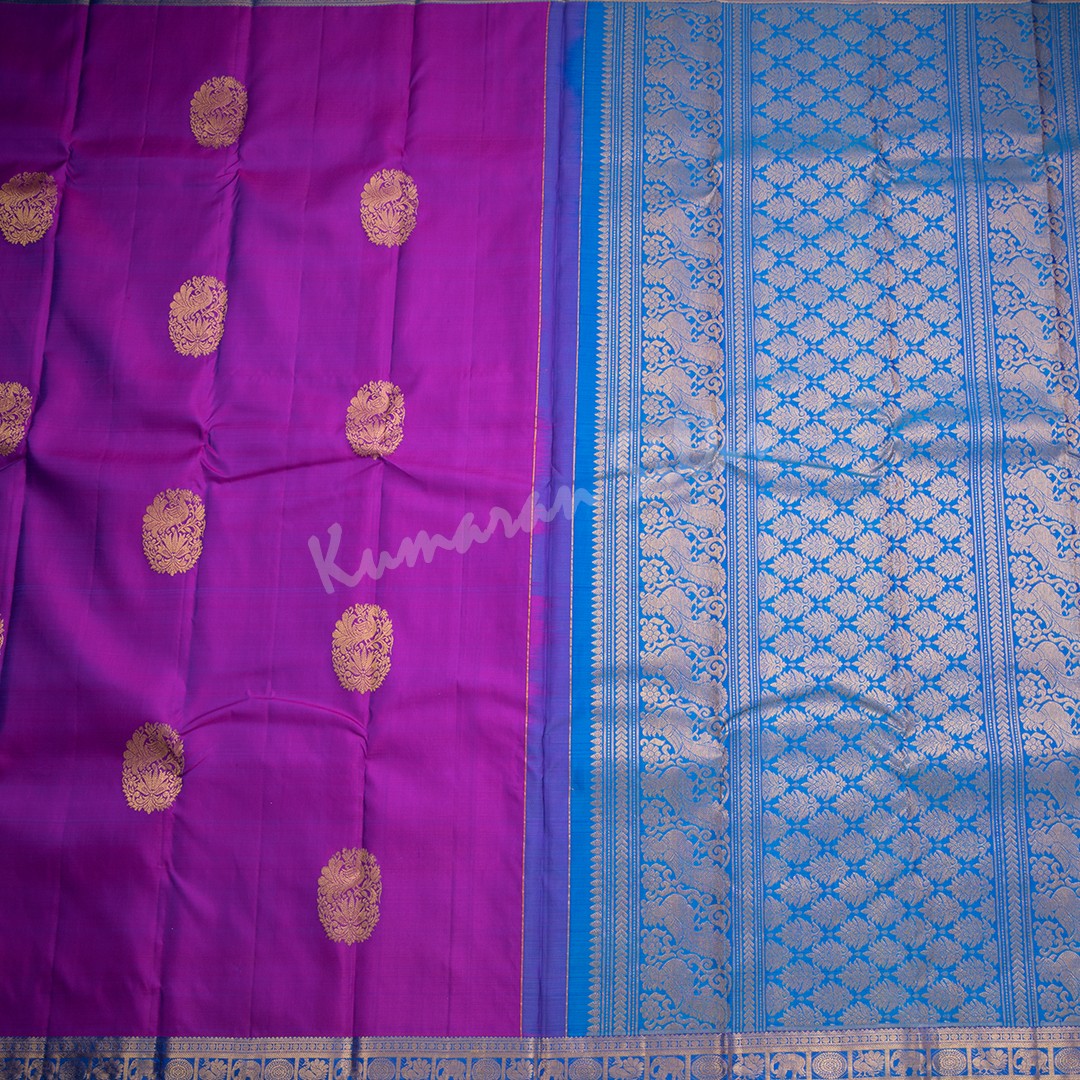 Purple Silk Saree With Peacock Design And Blue Zari border