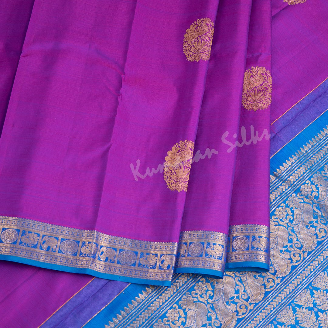 Purple Silk Saree With Peacock Design And Blue Zari border