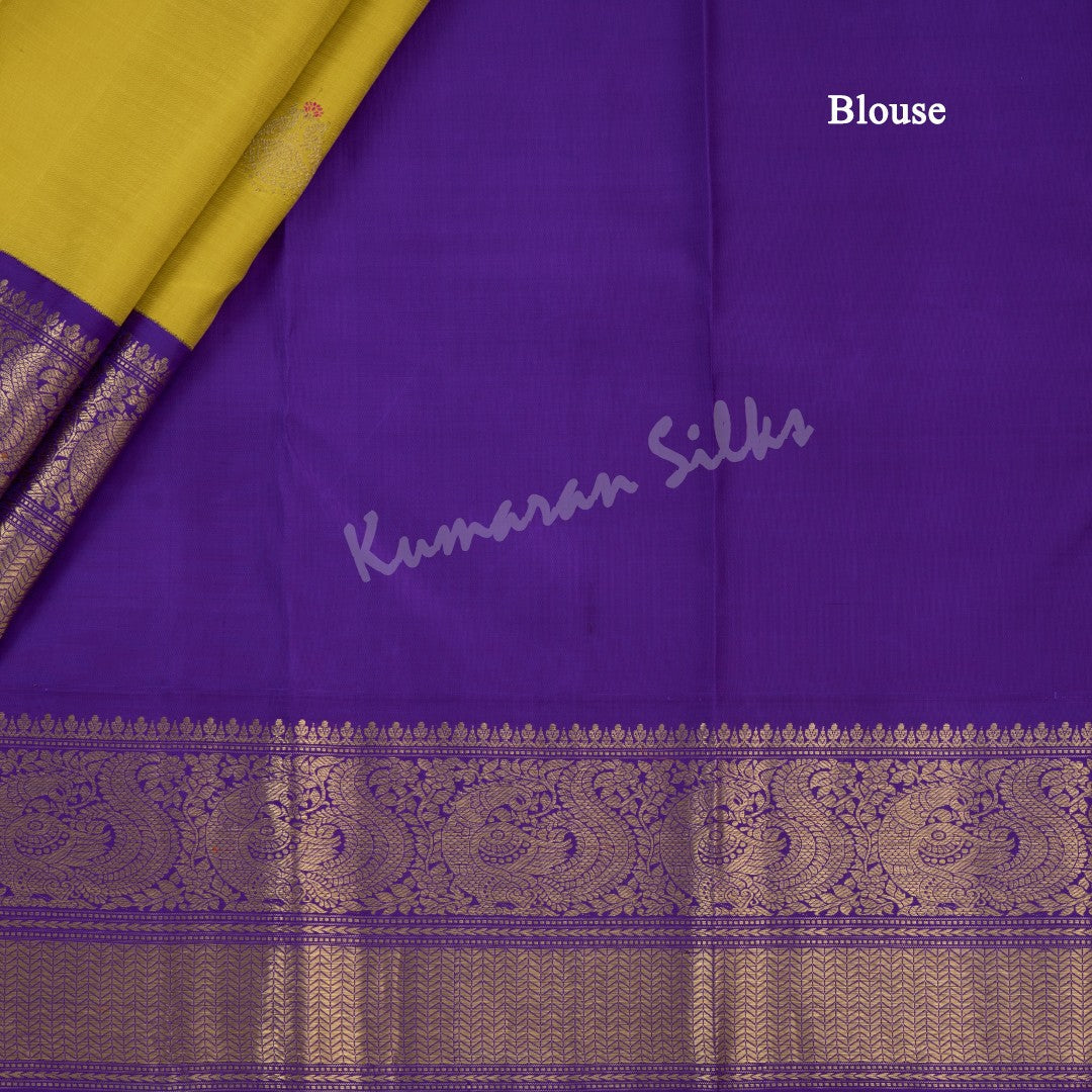 Mustard Yellow Silk Saree With Peacock Zari Buttas And Purple Zari Border