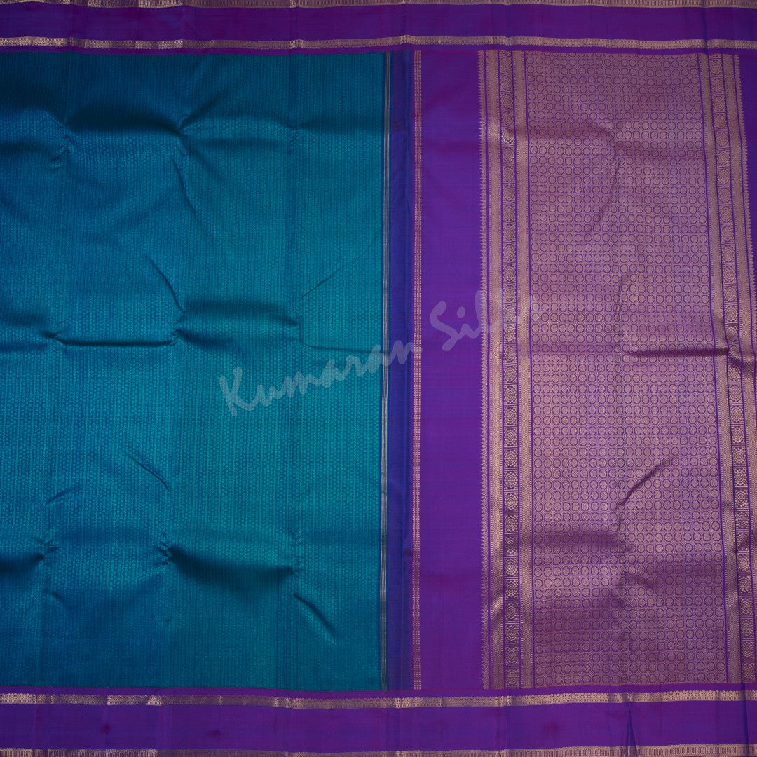 Peacock Blue Thread Work Silk Saree With Multi Design And Purple Border