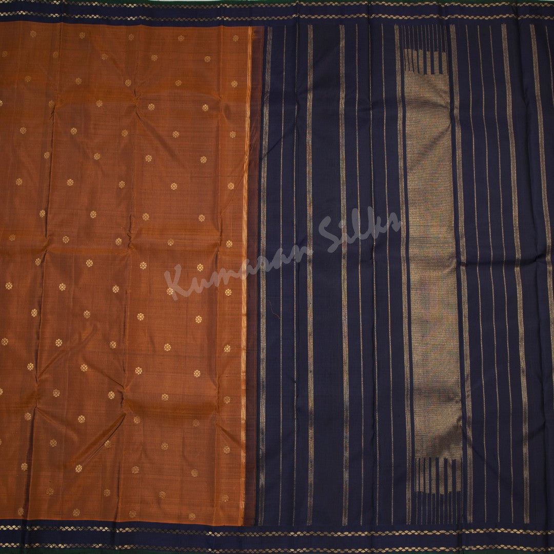 Cinnamon Brown Silk Saree With Small Buttas And Navy Blue Border