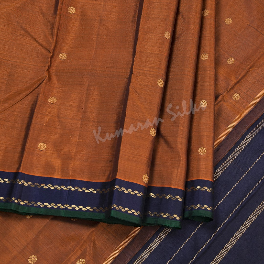 Cinnamon Brown Silk Saree With Small Buttas And Navy Blue Border