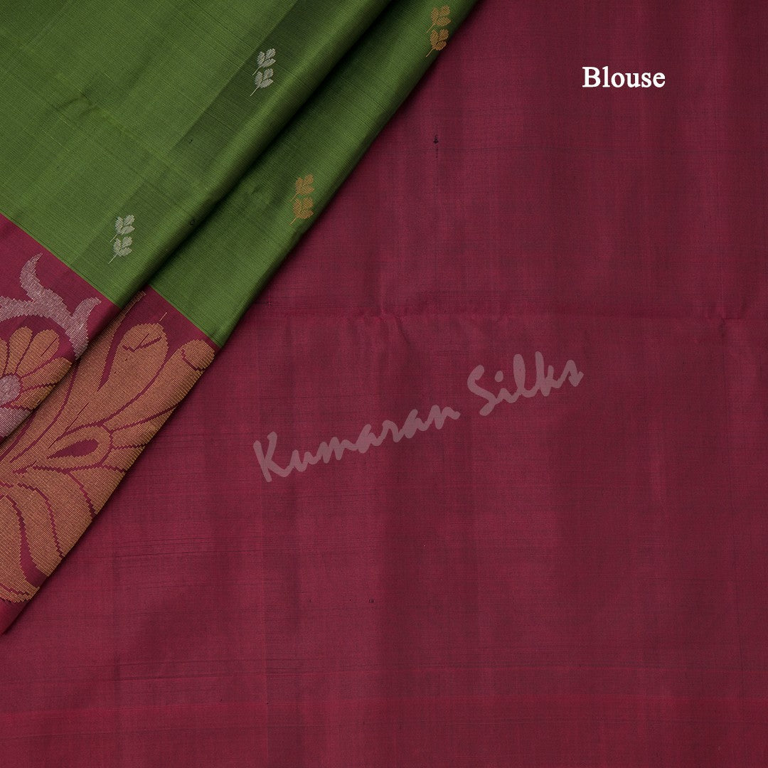 Olive Green Soft Silk Saree With Silver And Gold Buttas And Floral Border