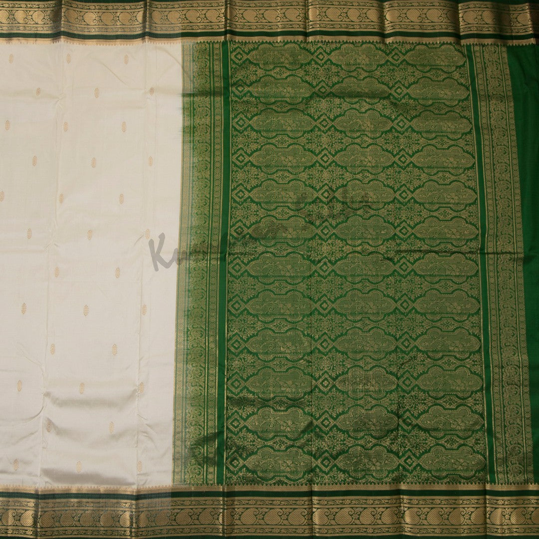 Pure Silk Cream Saree With Gold Zari Buttas And Contrast Border - Kumaran Silks