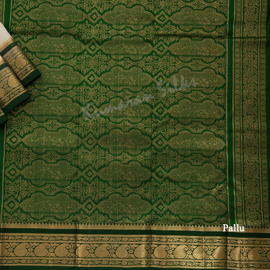 Pure Silk Cream Saree With Gold Zari Buttas And Contrast Border - Kumaran Silks