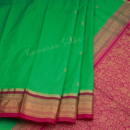 Pure Silk Parrot Green Saree With Gold Zari Buttas And Contrast Border - Kumaran Silks