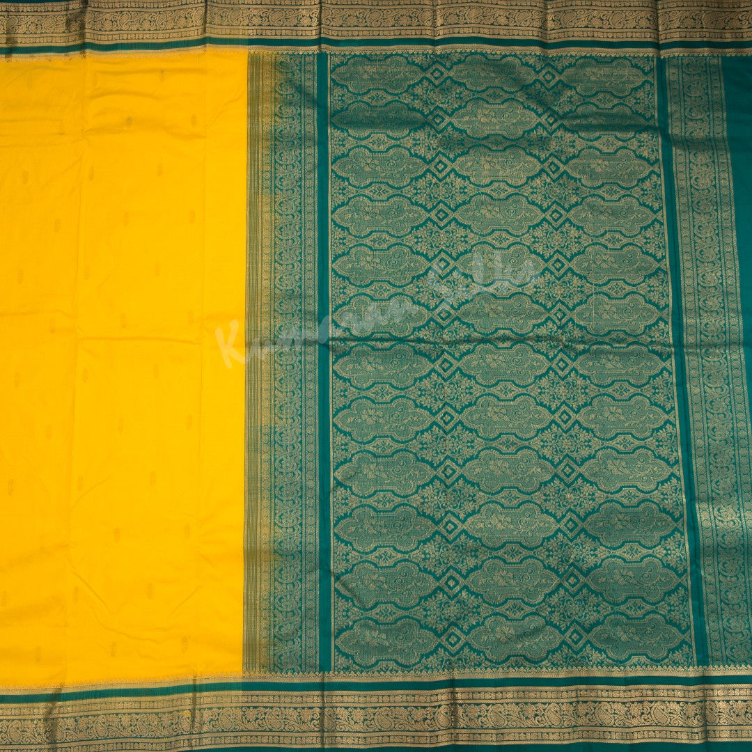 Pure Silk Yellow Saree With Gold Zari Buttas And Contrast Border - Kumaran Silks