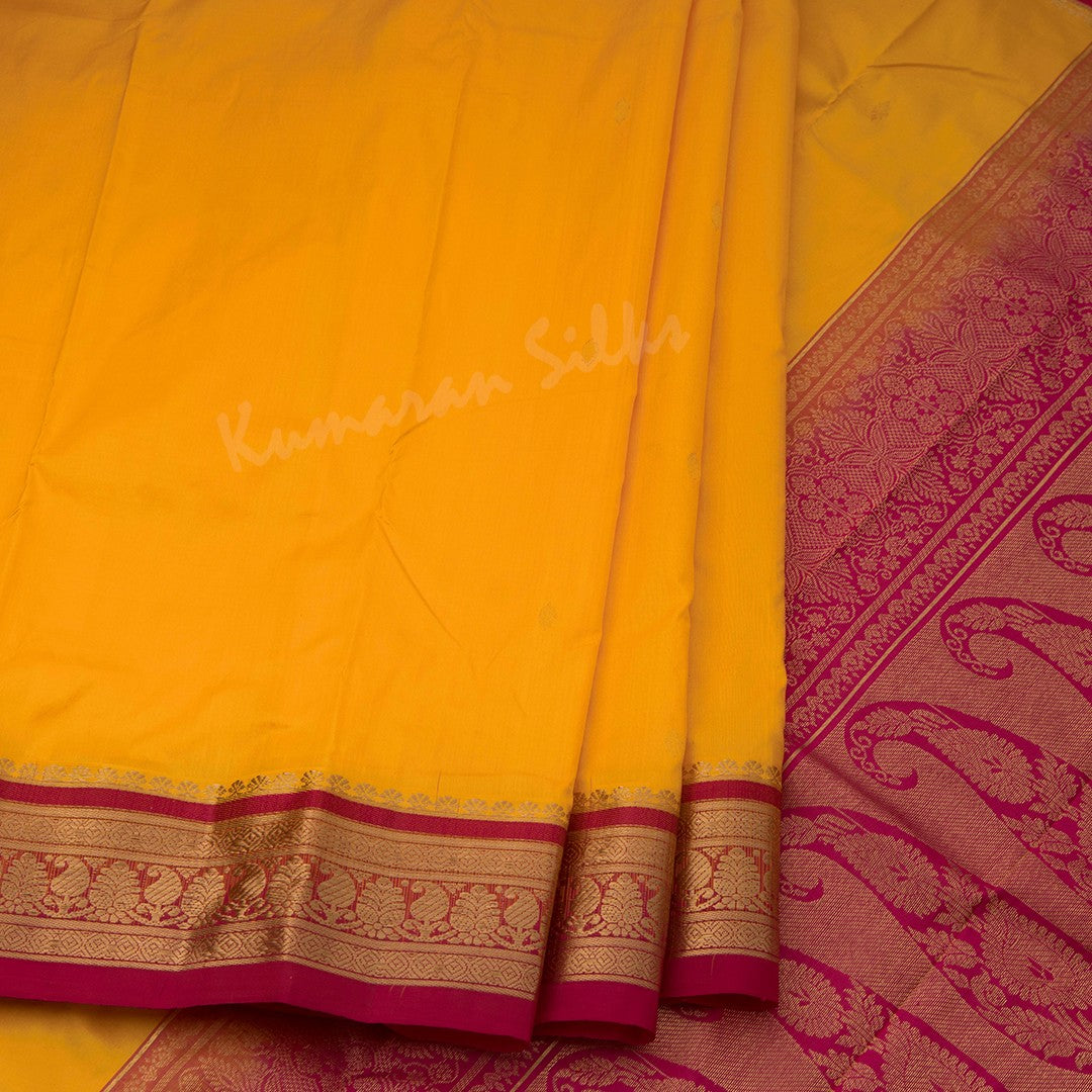 Pure Silk Mango Yellow Saree With Gold Zari Buttas And Contrast Border - Kumaran Silks