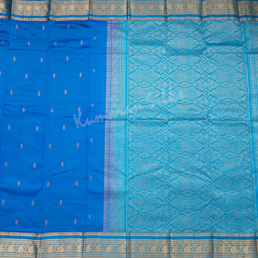 Pure Silk Azure Blue Saree With Gold Zari Buttas And Blue Border - Kumaran Silks