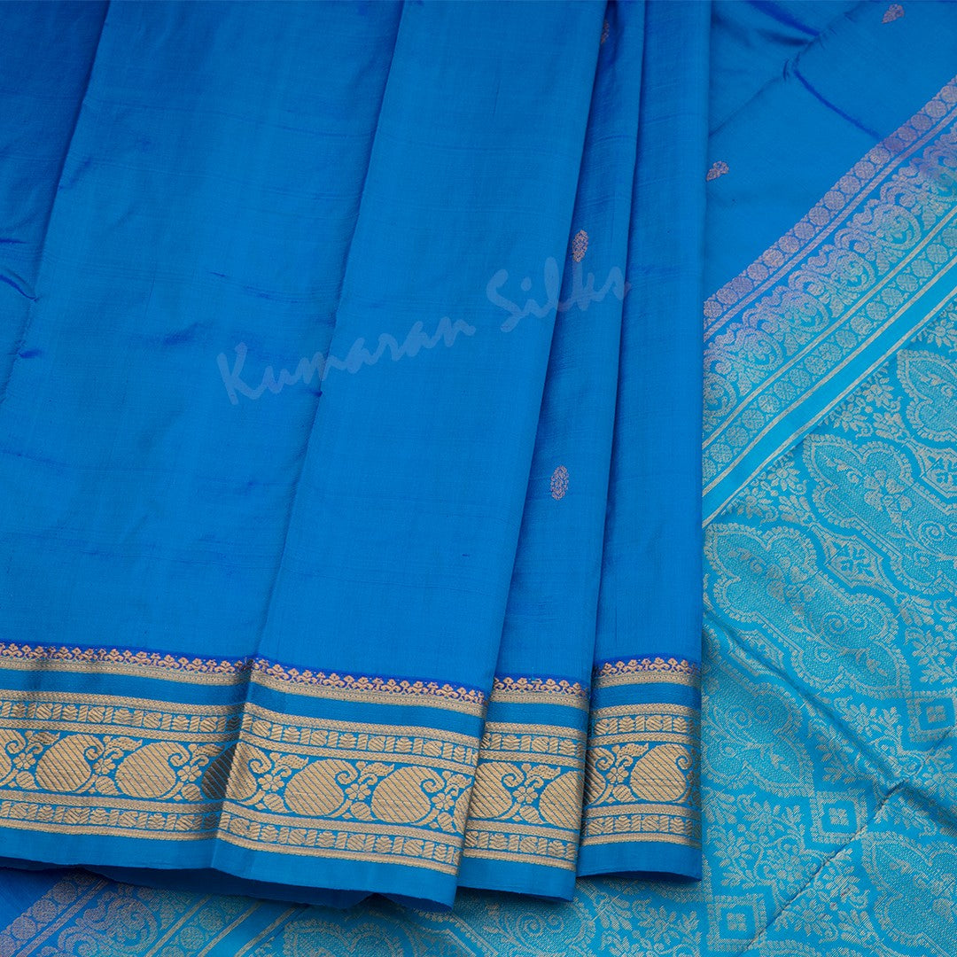 Pure Silk Azure Blue Saree With Gold Zari Buttas And Blue Border - Kumaran Silks