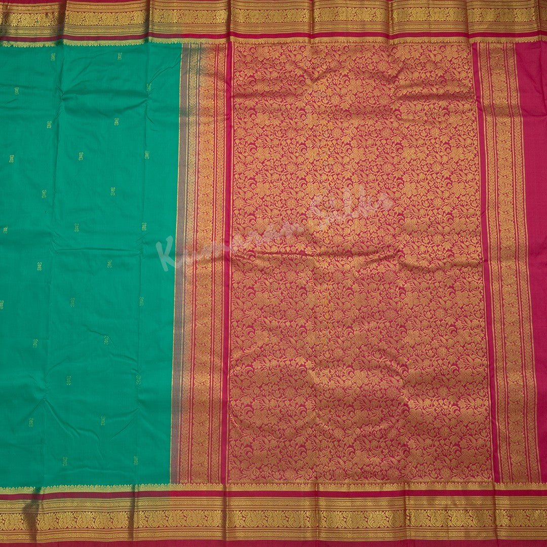 Pure Silk Jade Green Saree With Gold Zari Buttas And Contrast Border - Kumaran Silks