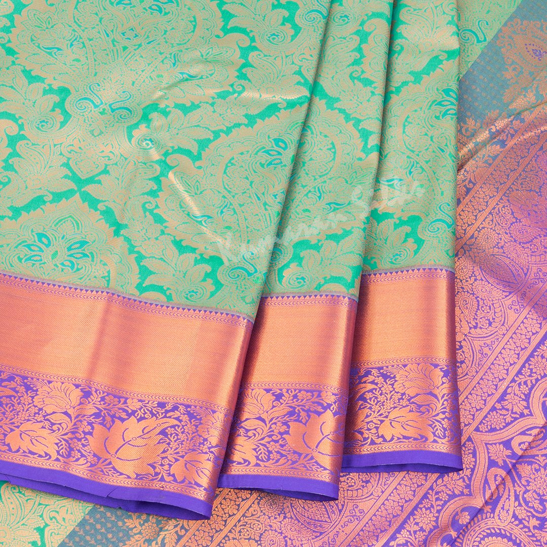 Semi Silk Jade Green Embossed Saree