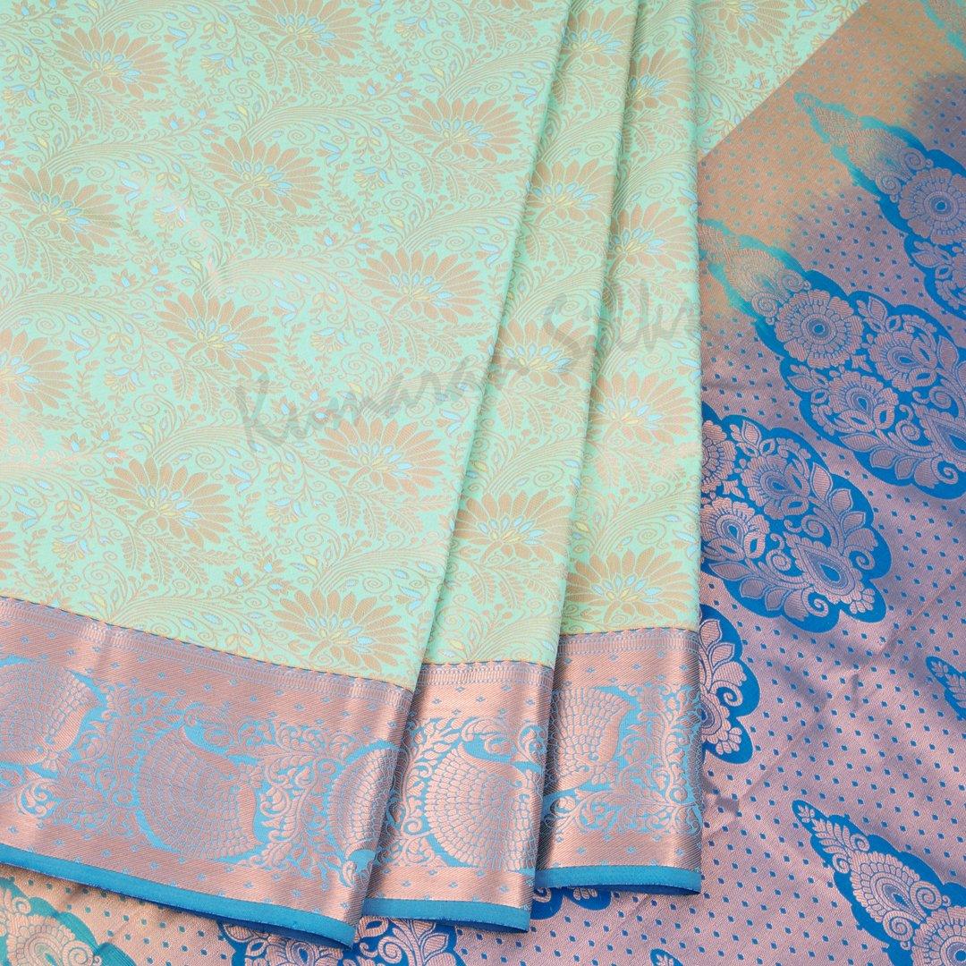 Semi Silk Sea Green Embossed Saree - Kumaran Silks