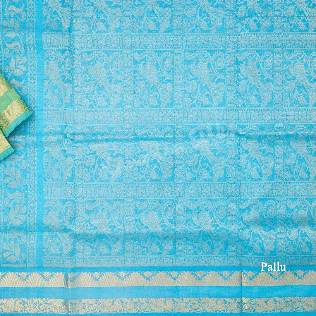 Amirthavarshini Silk Cotton Parrot Green Saree With Zari Buttas