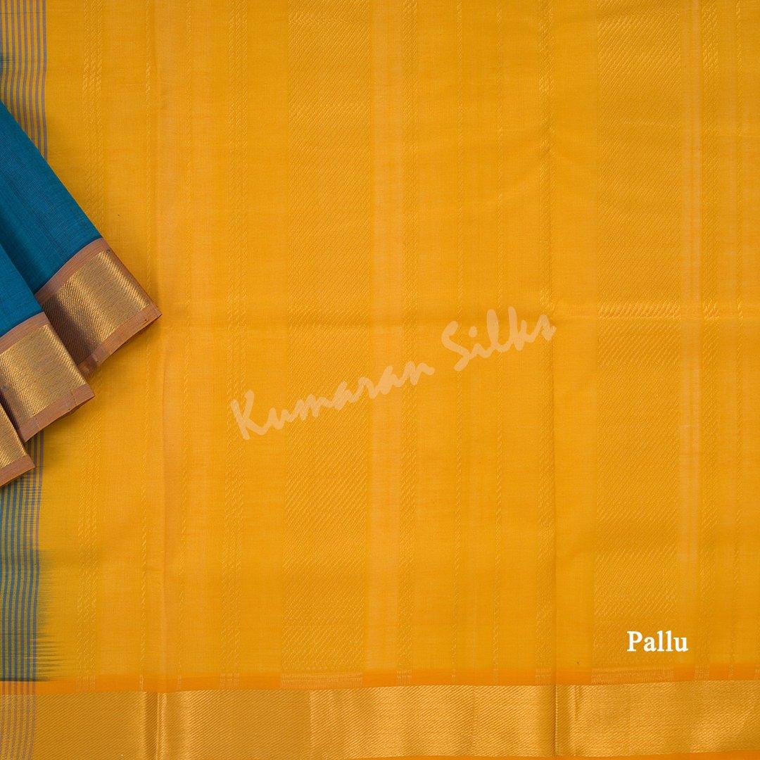 Amirthavarshini Silk Cotton Peacock Blue Plain Saree