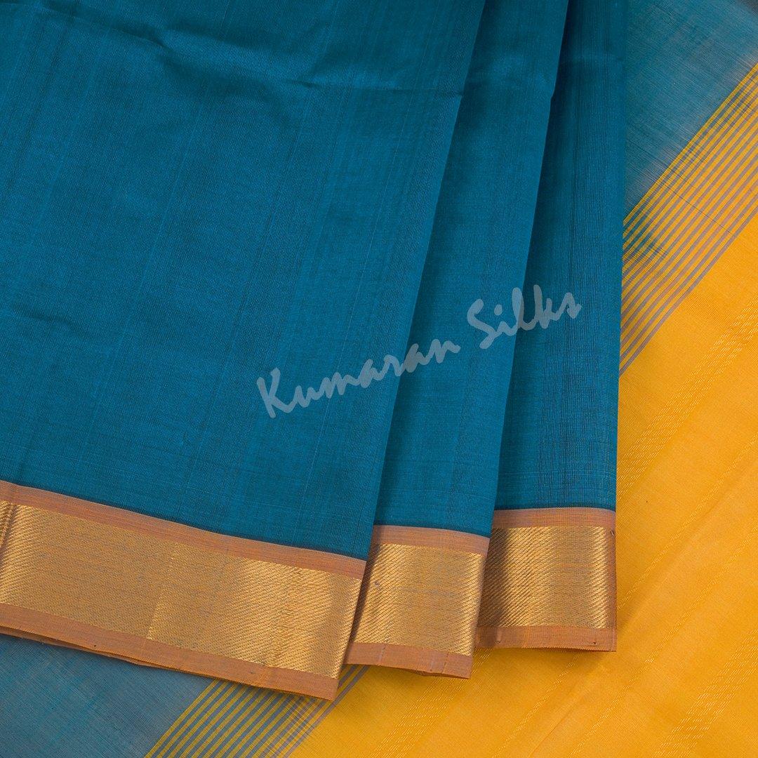 Amirthavarshini Silk Cotton Peacock Blue Plain Saree