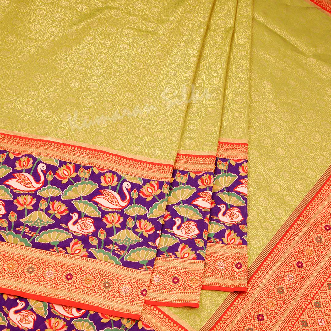 Semi Banaras Lime Green Zari Worked Saree With Lotus And Chakra Buttas