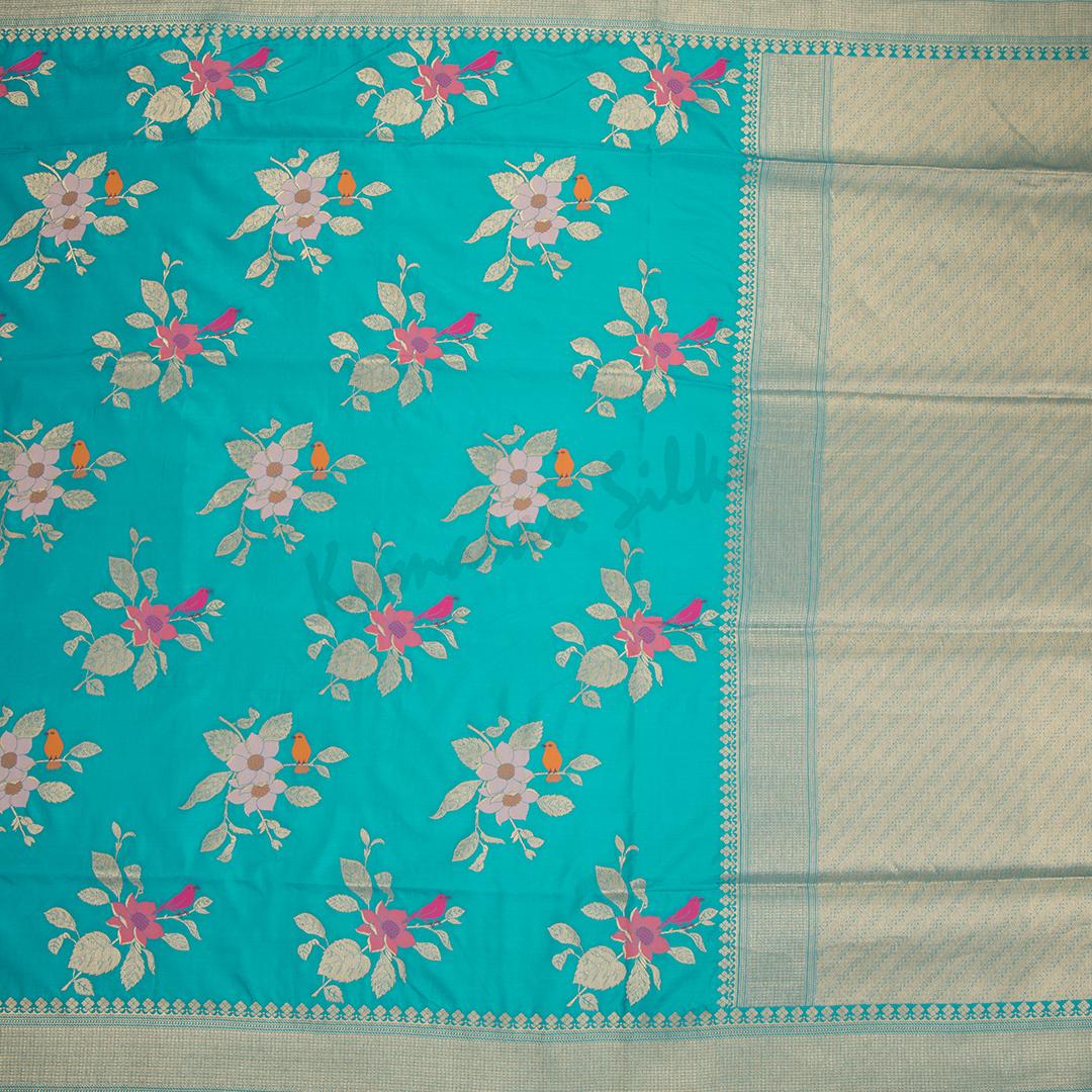 Semi Banaras Cyan Blue Thread Embossed Saree With Floral Design - Kumaran Silks