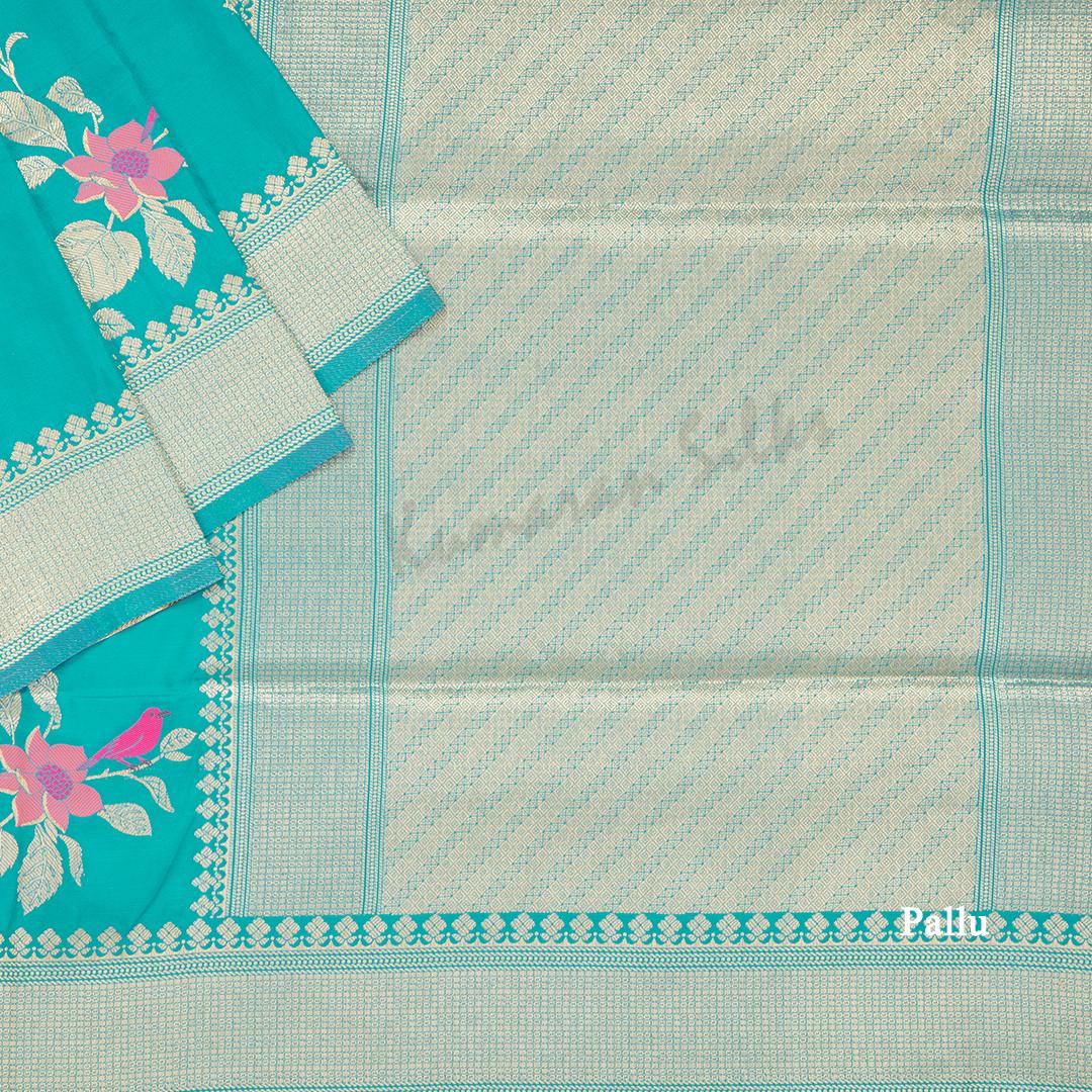 Semi Banaras Cyan Blue Thread Embossed Saree With Floral Design - Kumaran Silks