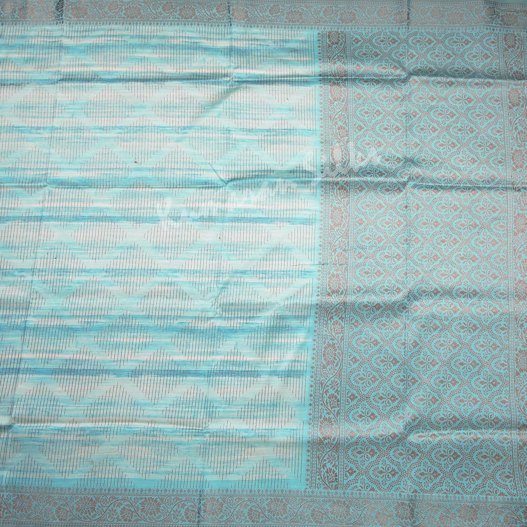 Semi Raw Silk Sky Blue Zari Embossed Saree