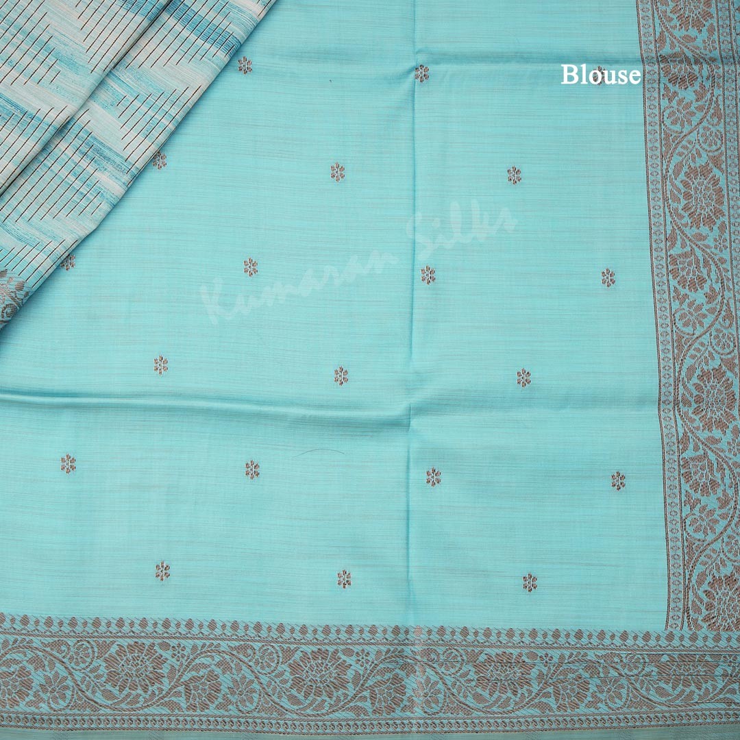 Semi Raw Silk Sky Blue Zari Embossed Saree