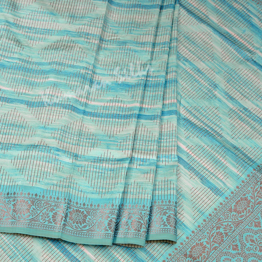 Semi Raw Silk Sky Blue Zari Embossed Saree