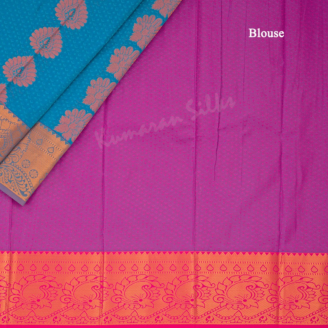 Art Silk Blue Saree With Embossed Design And Zari Buttas