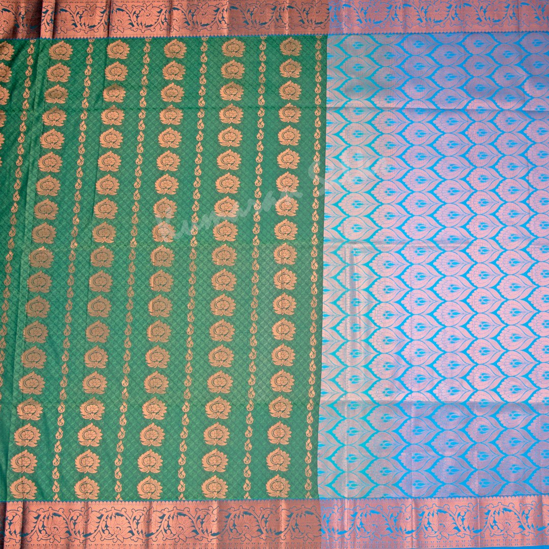 Art Silk Dark Green Saree With Embossed Design And Zari Buttas