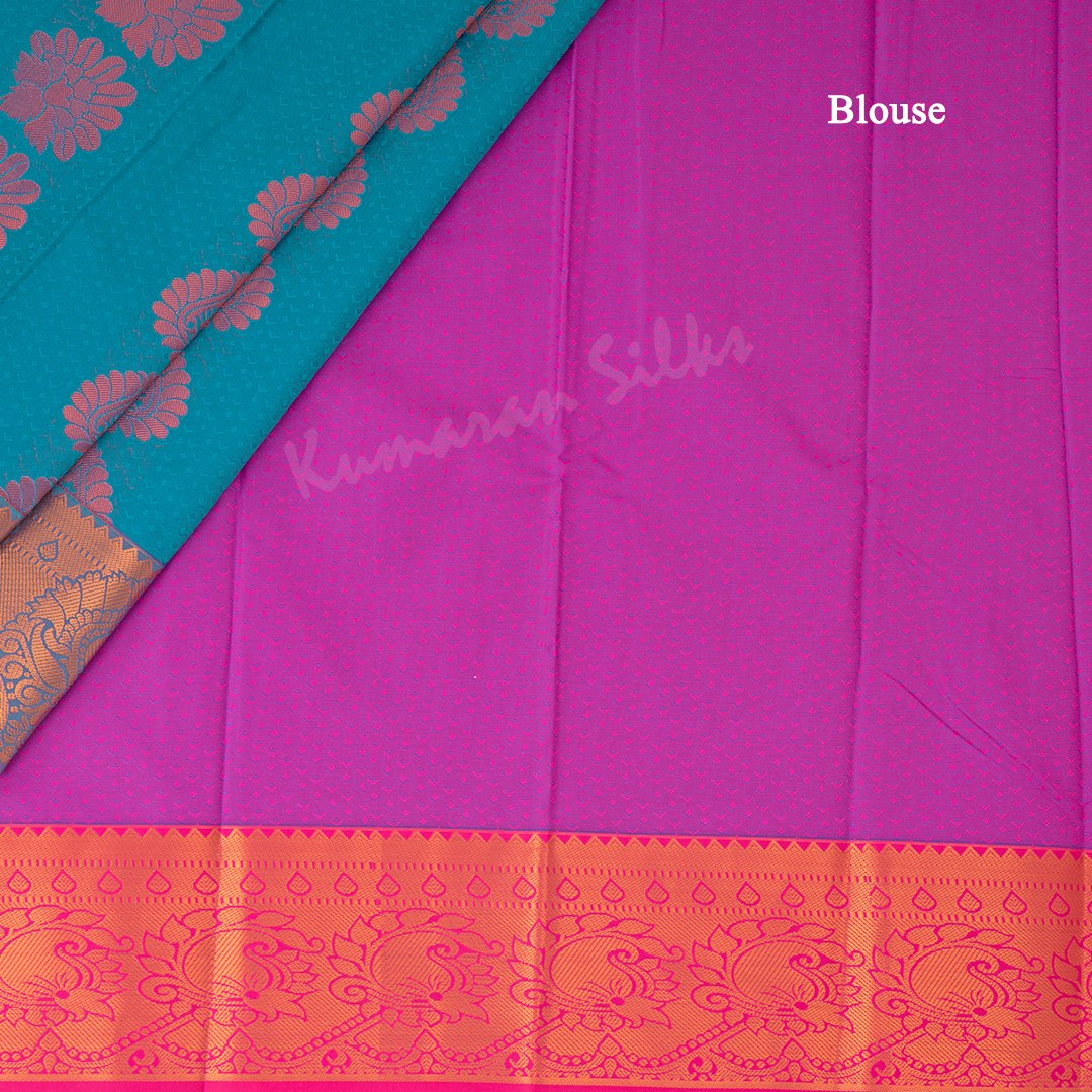 Art Silk Peacock Blue Saree With Embossed Design And Zari Buttas 02