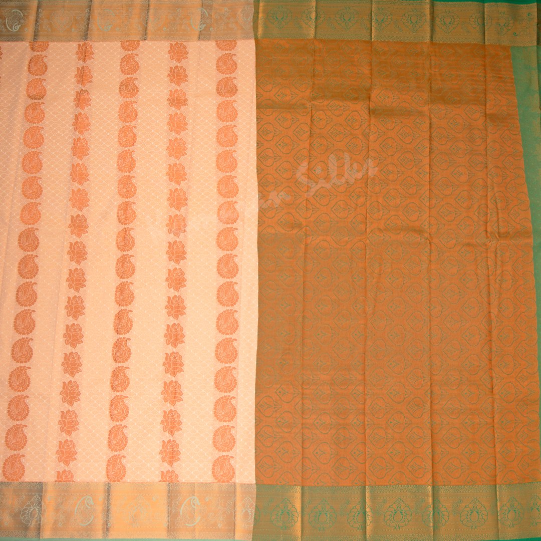 Art Silk Light Peach Saree With Embossed Design And Zari Buttas