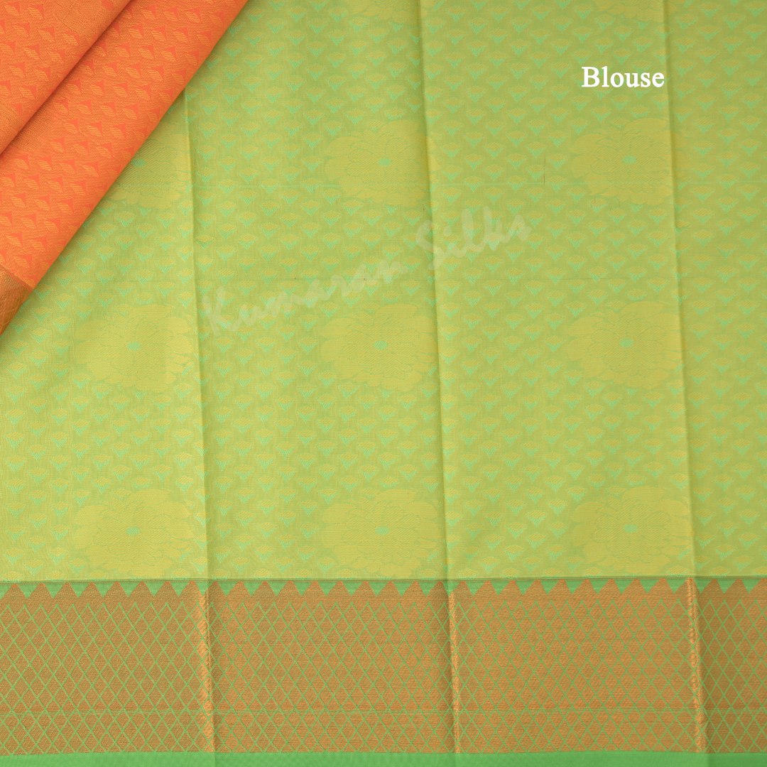 Art Silk Light Orange Saree With Embossed Design And Zari Buttas