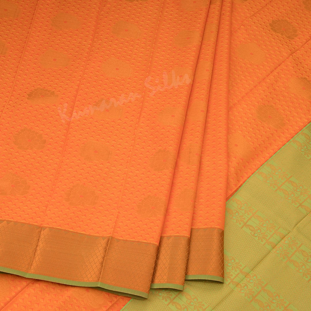 Art Silk Light Orange Saree With Embossed Design And Zari Buttas