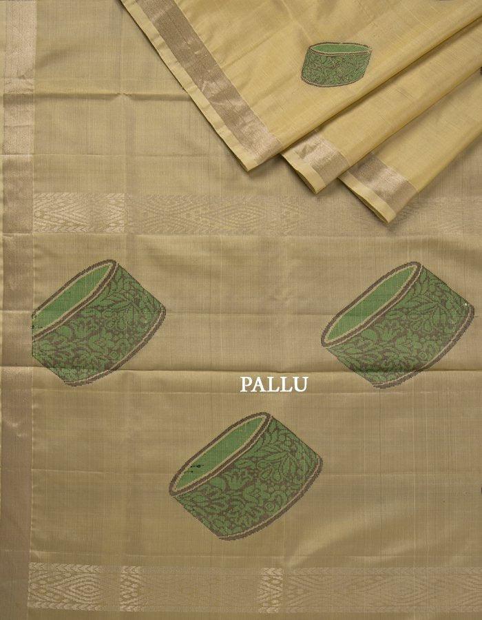 Beige Soft Silk Saree With Green Instrument Patterned Thread Work - Kumaran Silks