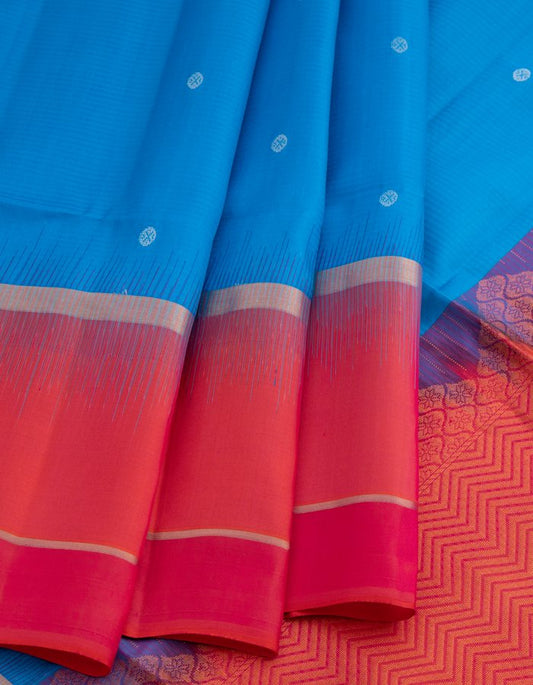 Blue Soft Silk Saree With Coin Zari Buttis And Copper Zari Worked Pink Zig Zag Pallu Kumaran Silks